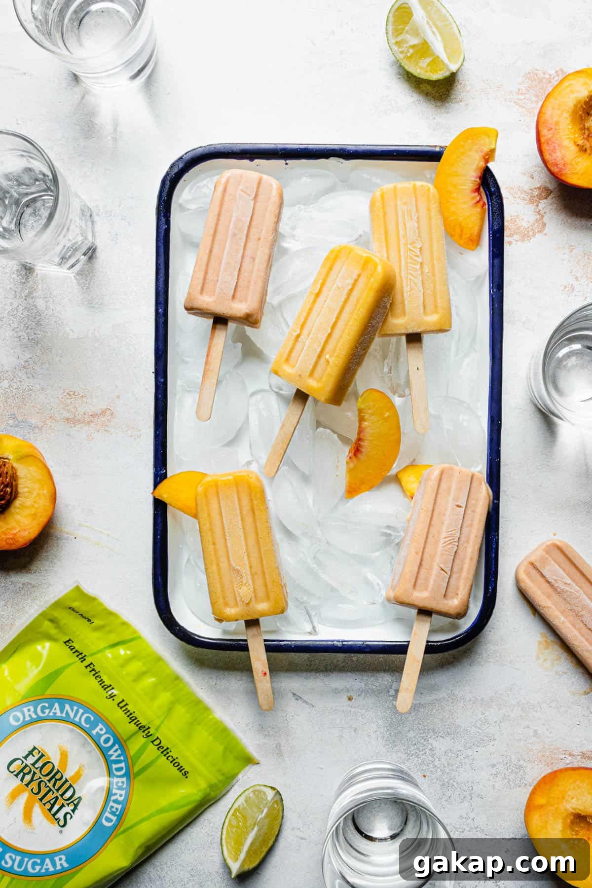 Refreshing Peach Pie Popsicles Recipe: Homemade Summer Dessert 4 Peach popsicles on tray