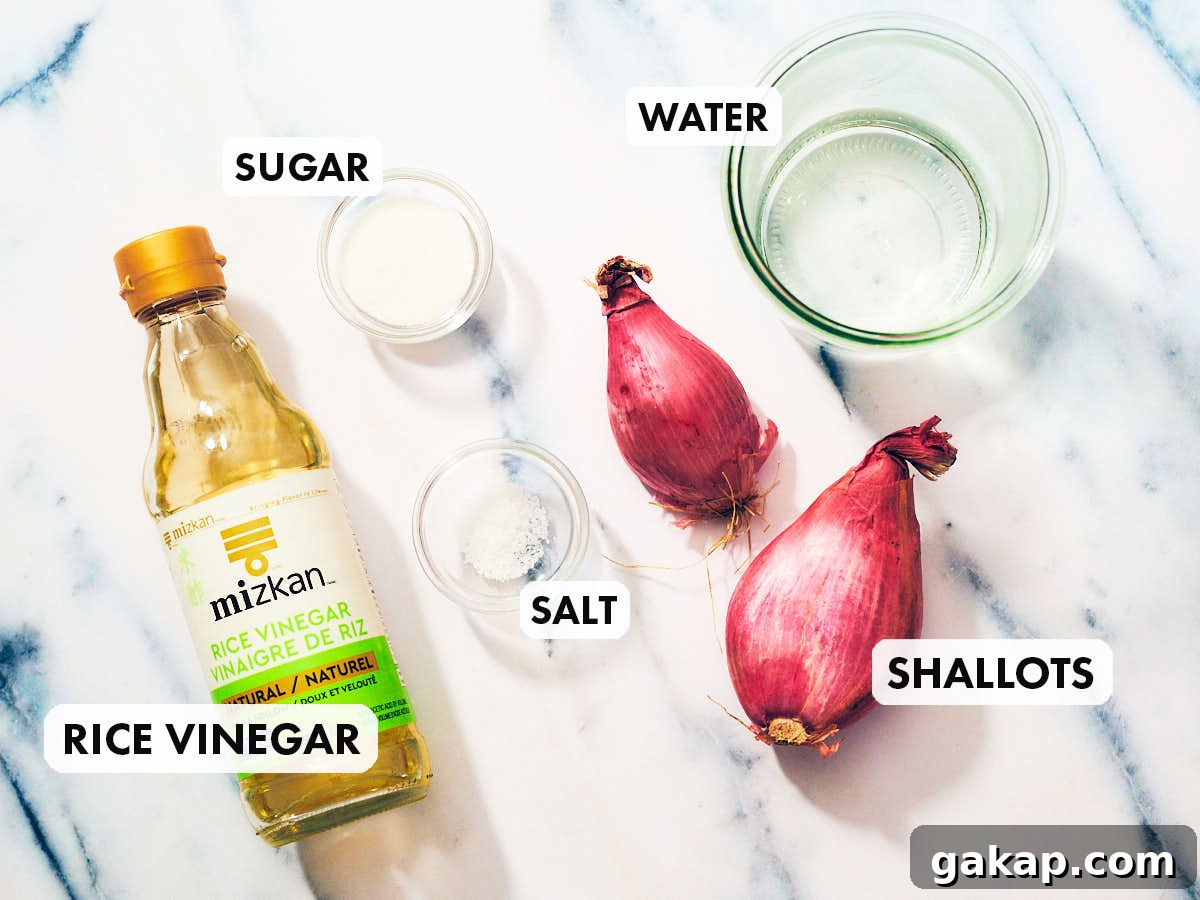 5 ingredients to make easy pickled shallots including vinegar, water, salt, and sugar.