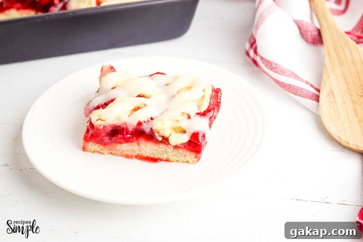 Cherry Pie Bar slice on white plate