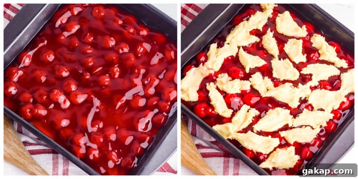 Cherry pie filling with crust dough on top in baking pan