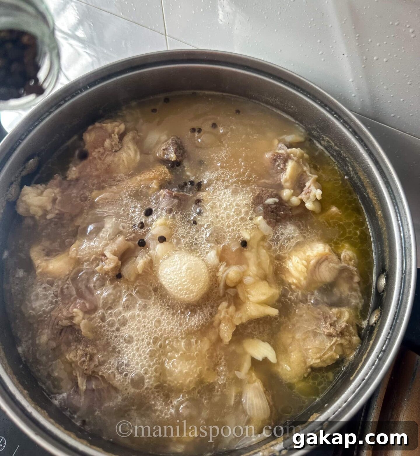 Simmering the beef until tender