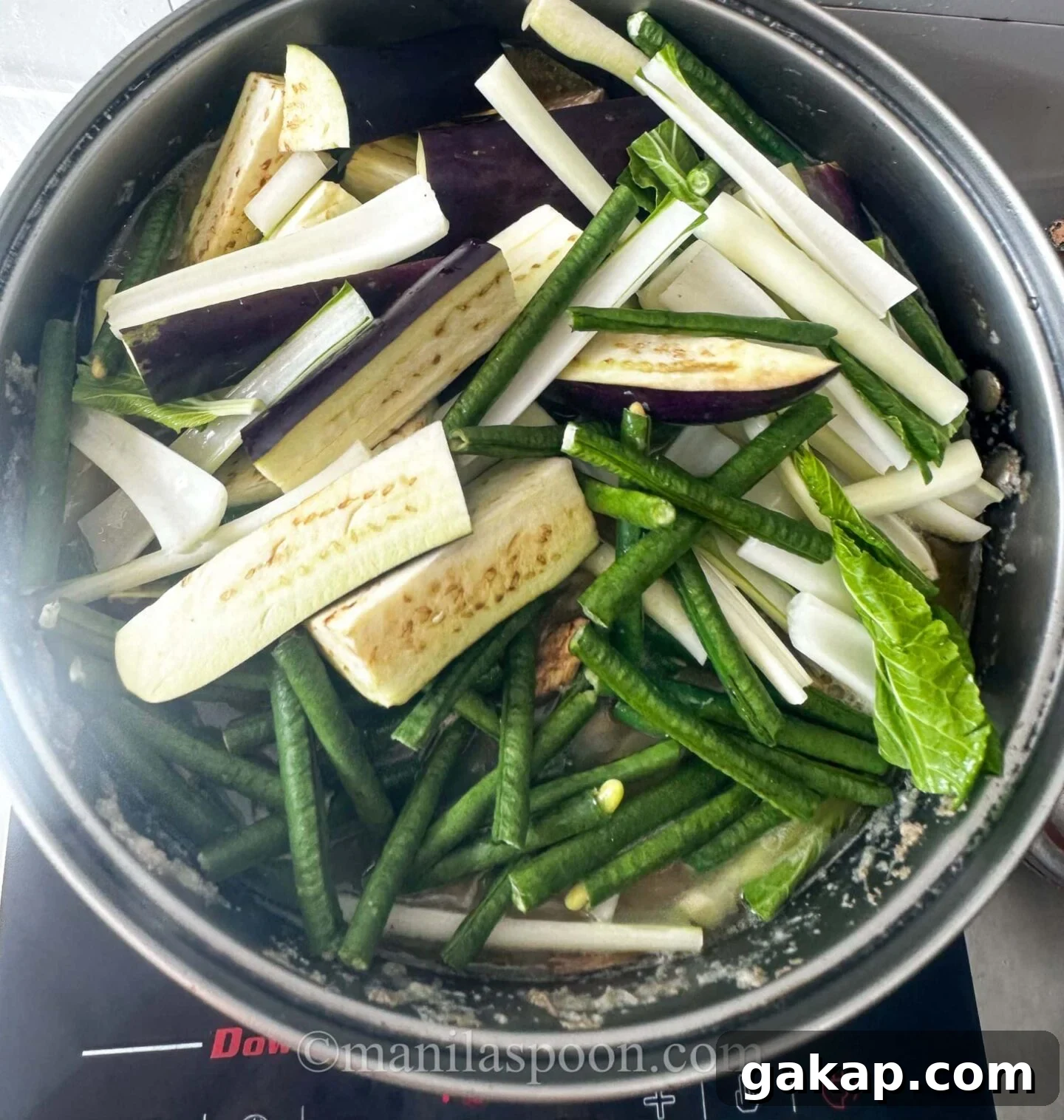 Adding the vegetables to the mix