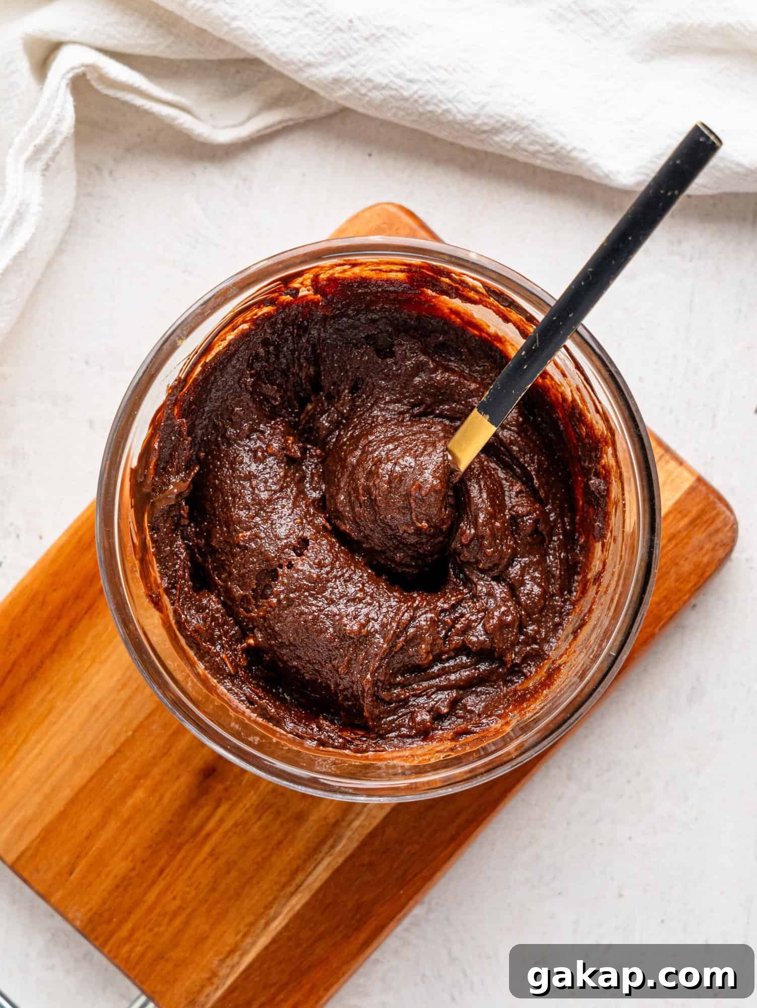 Healthy chocolate fudge mixture in a glass bowl.