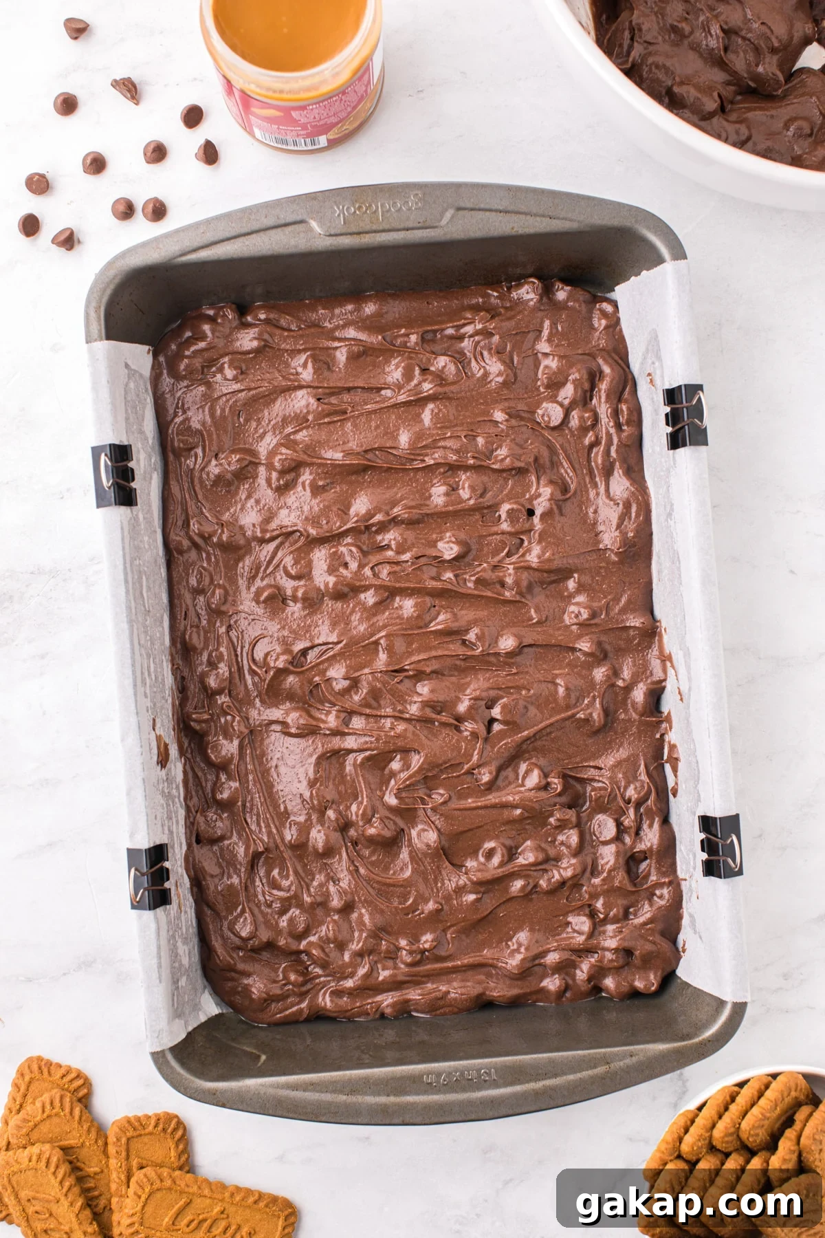 A baking pan filled with brownie batter.