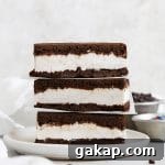 Front view of three gluten free ice cream sandwiches on a plate