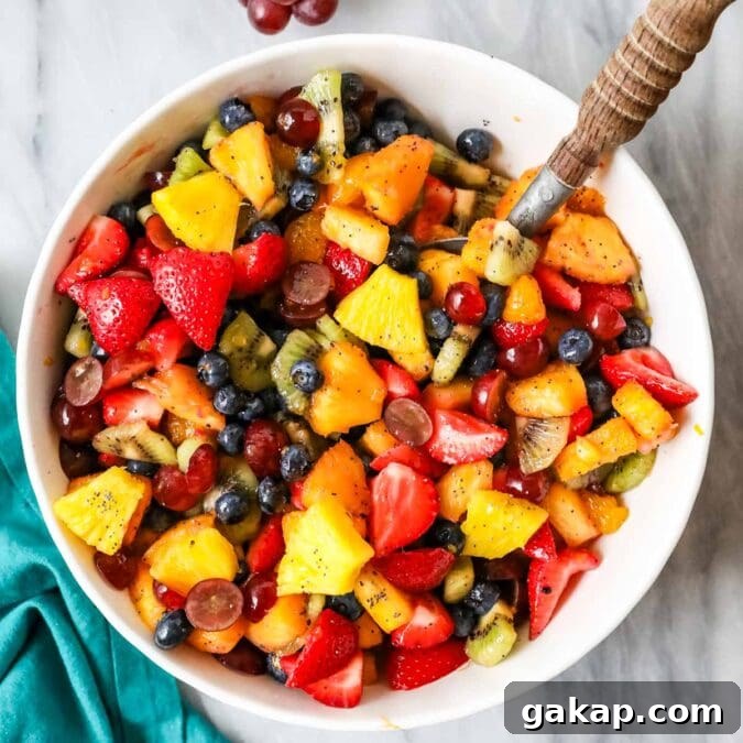 Overhead view of a bowl of fruit salad.