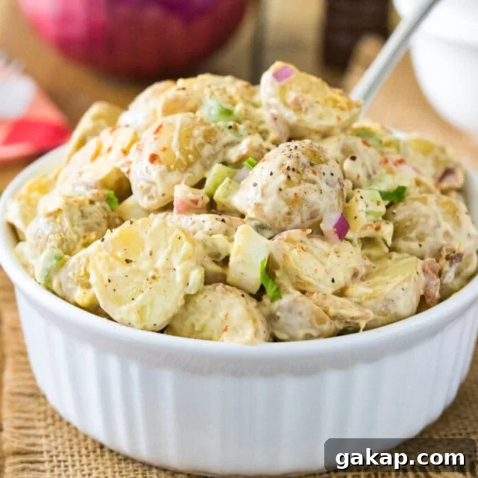 Large serving bowl of potato salad.