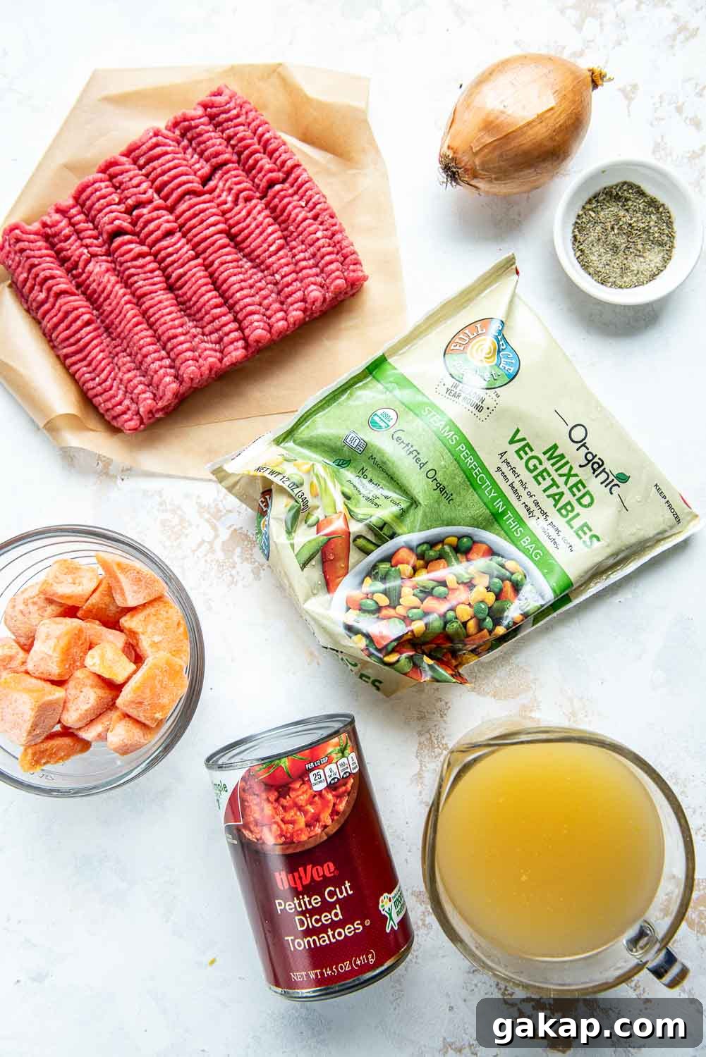 Ground beef, petite cut diced tomatoes, bone broth, mixed vegetables and 1 shallot