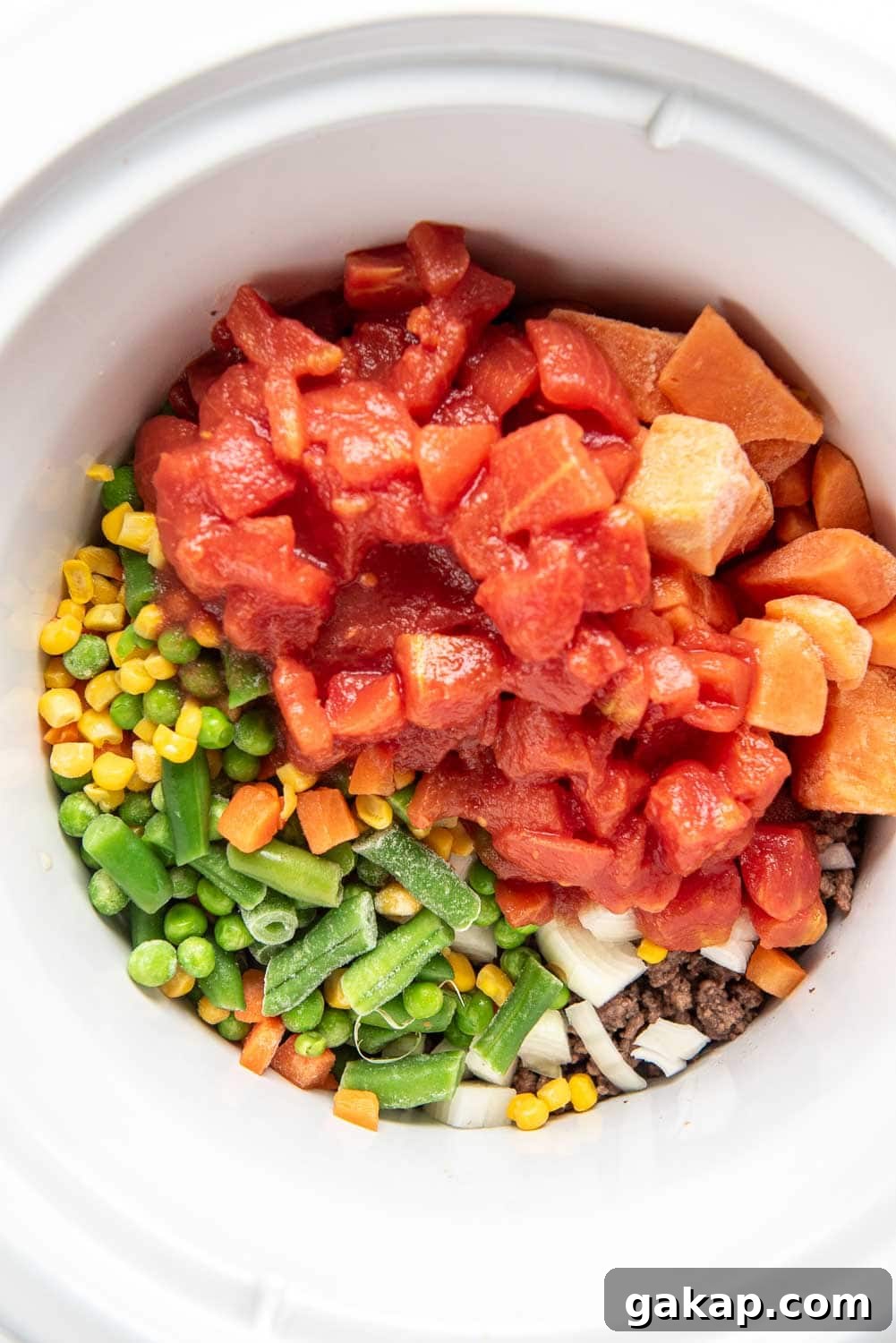 Ground beef, chopped shallot, mixed vegetables, and petite diced tomatoes