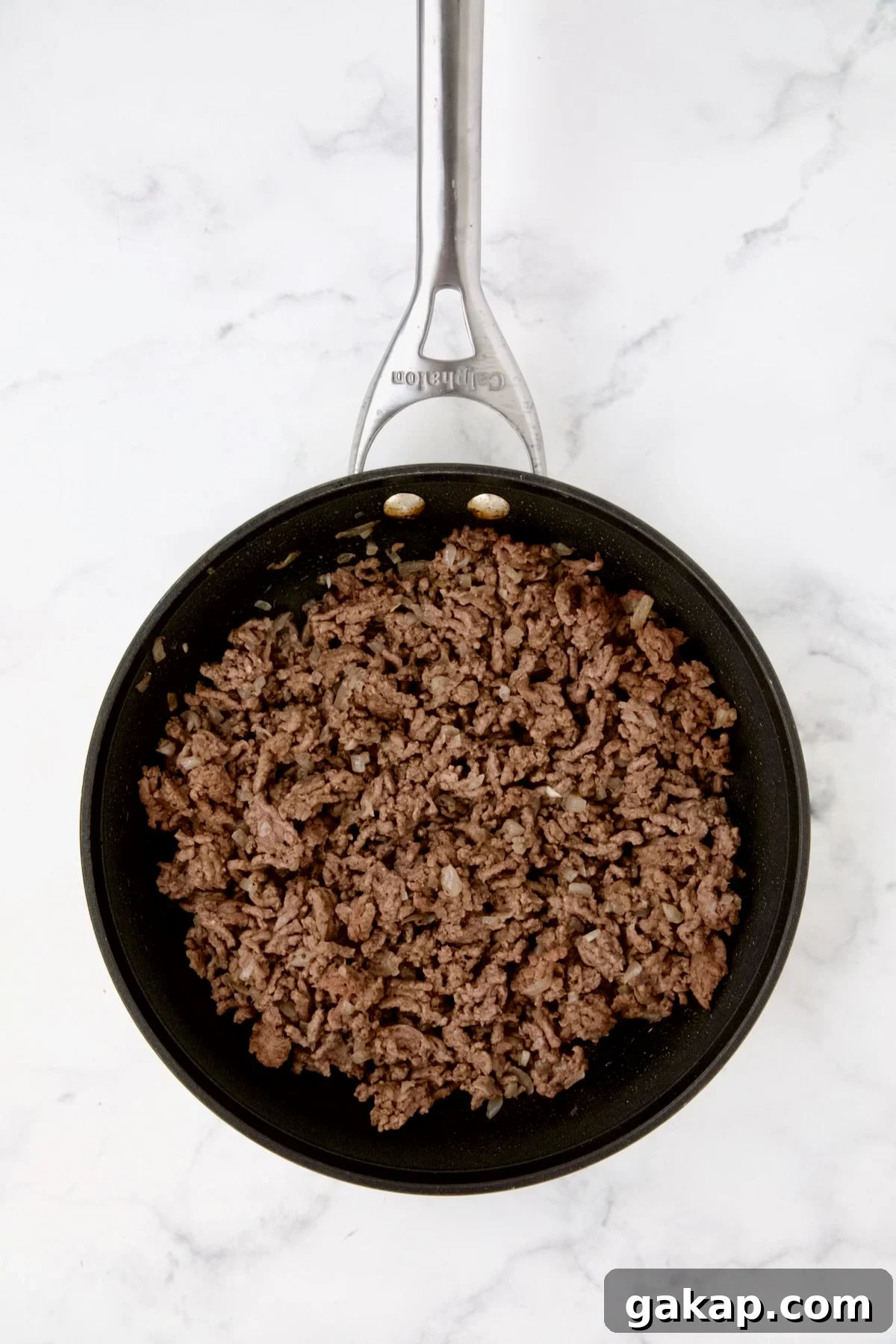 Mini Pepper Tacos: Flavor-Packed Taco-Stuffed Peppers 6 Cooked ground beef in nonstick skillet.