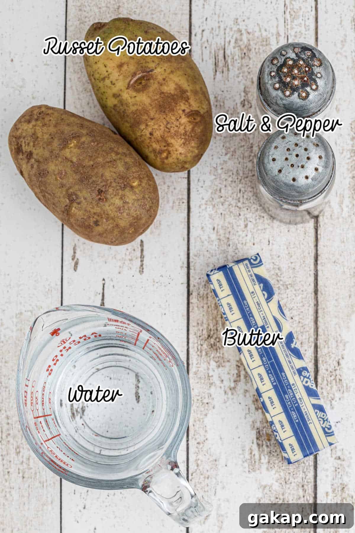 Comforting Stewed Potatoes Recipe with Garlic and Herbs 3 Overhead shot of ingredients needed to make stewed potatoes.