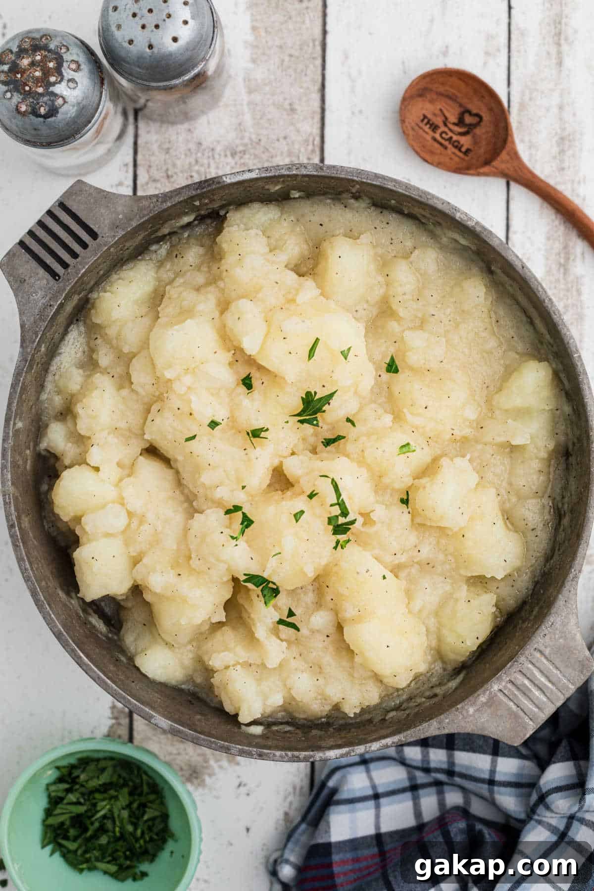 Comforting Stewed Potatoes Recipe with Garlic and Herbs 4 Overhead shot of a pot of stewed potatoes.
