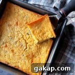 Serving a piece of Cowboy Corn Casserole.