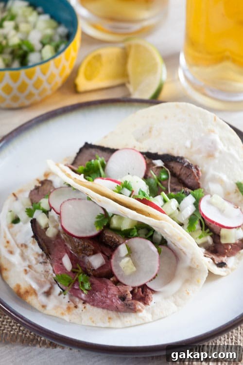 Grilled Lamb Tacos with Cucumber Salsa and Yogurt