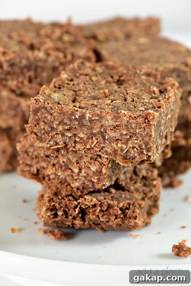 These No Bake Cookie Bars are so simple to make and even more delicious to eat! Made of oats, chocolate, and coconut, these no bake cookie bars are a favorite! 