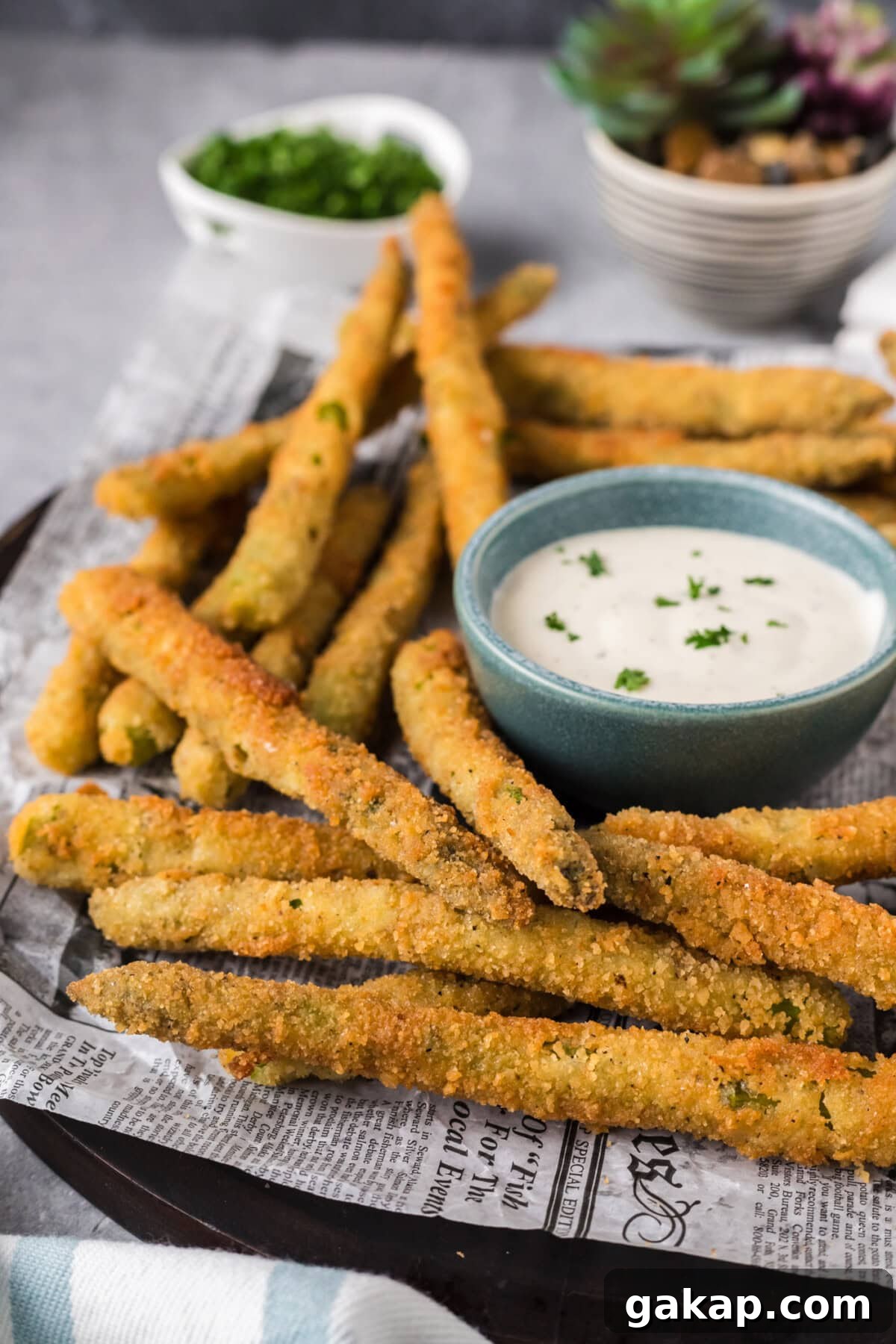 Crispy Pan-Fried Asparagus with Garlic and Lemon 3 Fried Asparagus on a plate with ranch for dipping in a bowl