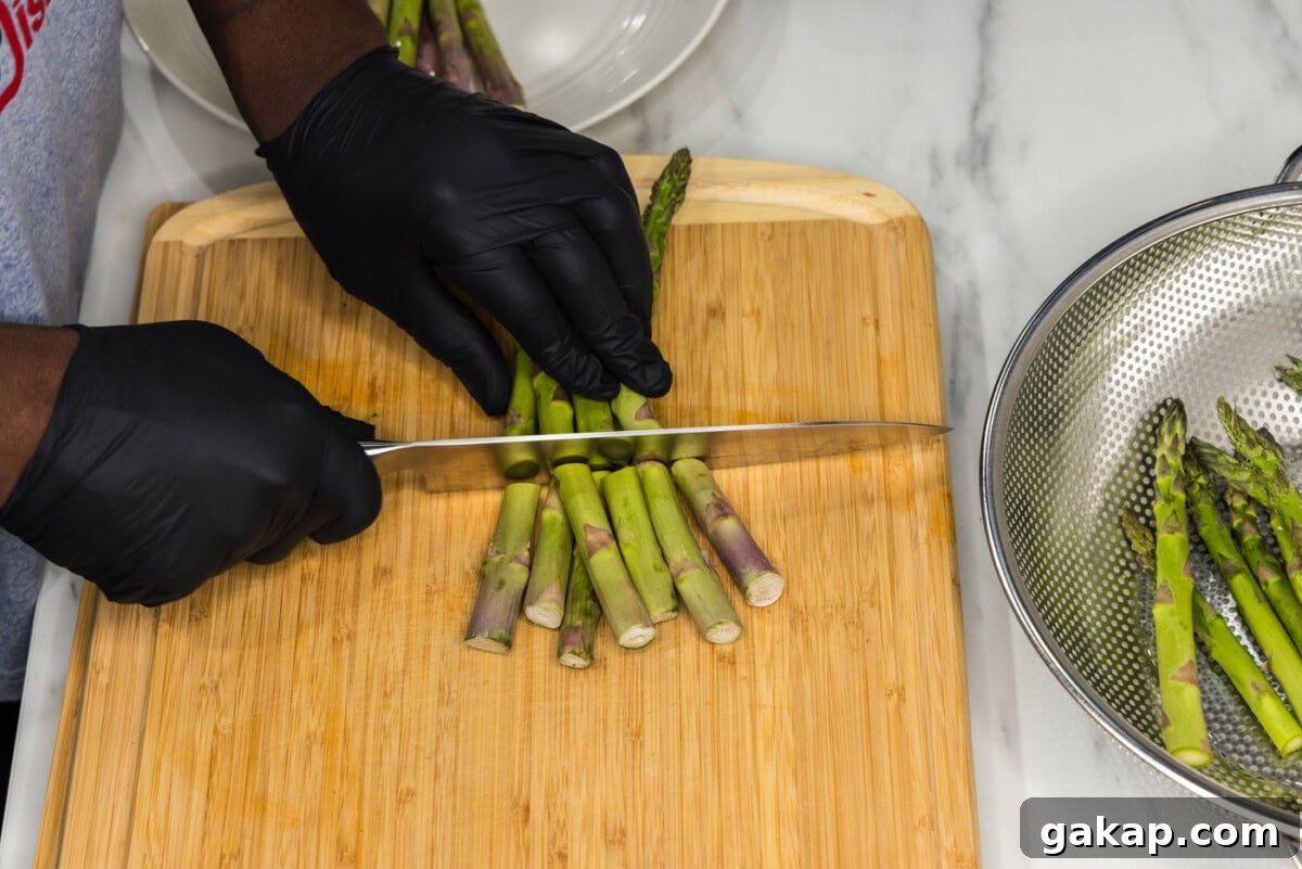Crispy Pan-Fried Asparagus with Garlic and Lemon 5 cutting woody ends off asparagus spears
