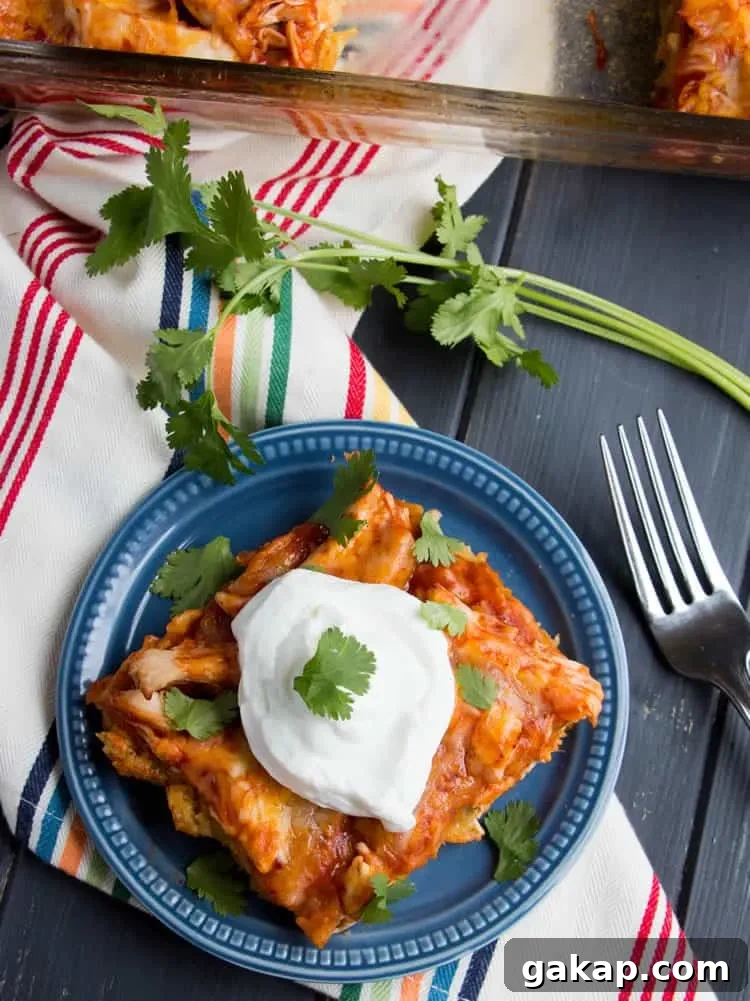 Easy Chicken Tamale Casserole. A layer of moist, savory cornbread is topped with chicken, enchilada sauce and cheese.