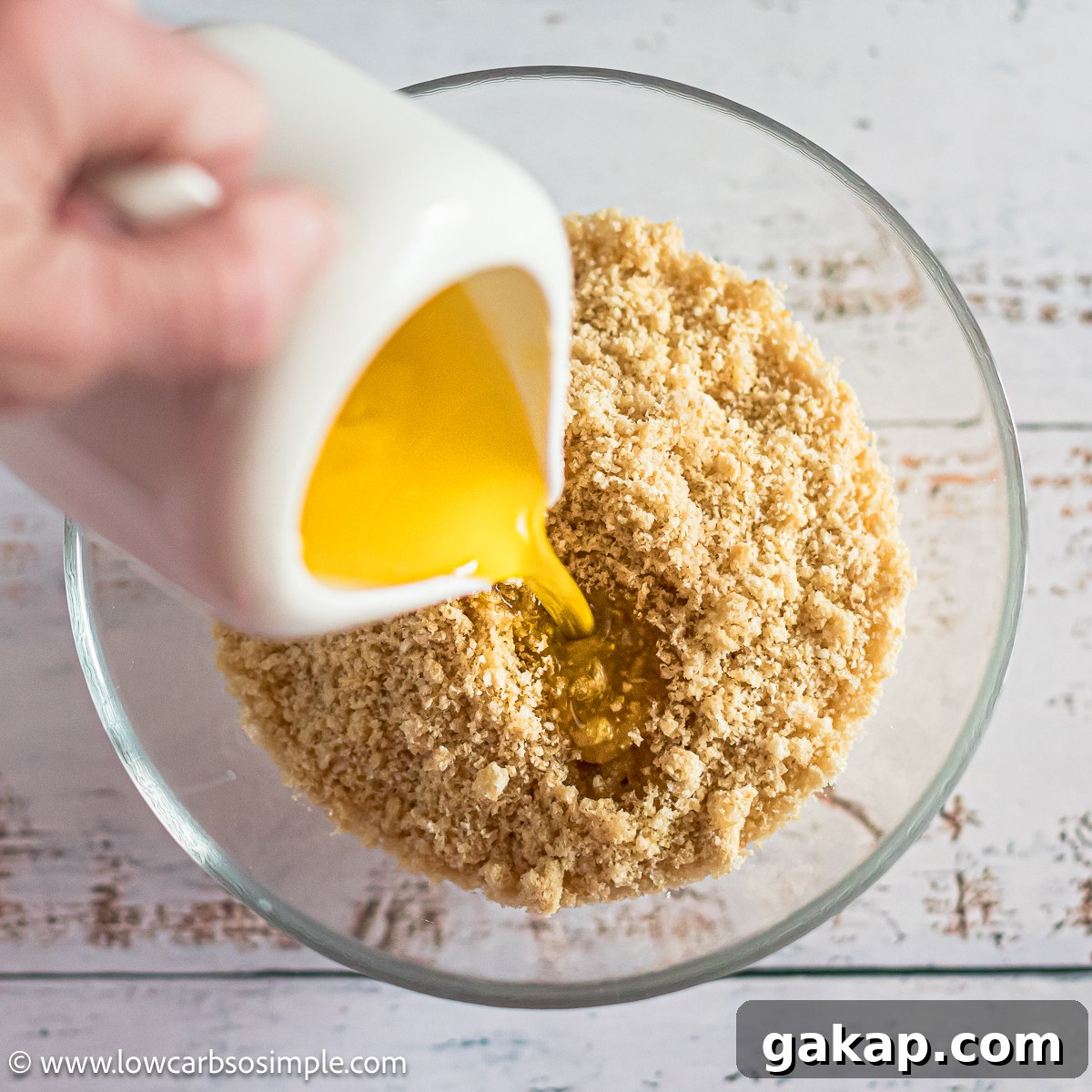 Pouring Melted Butter into Pork Rind Crush | Low-Carb, So Simple