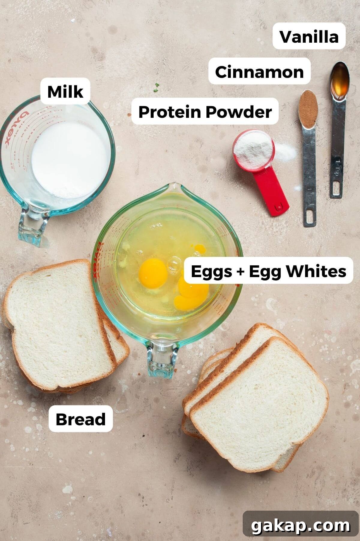 All ingredients in protein powder french toast labeled in small bowls, including: bread, eggs, egg whites, milk, protein powder, cinnamon, and vanilla.