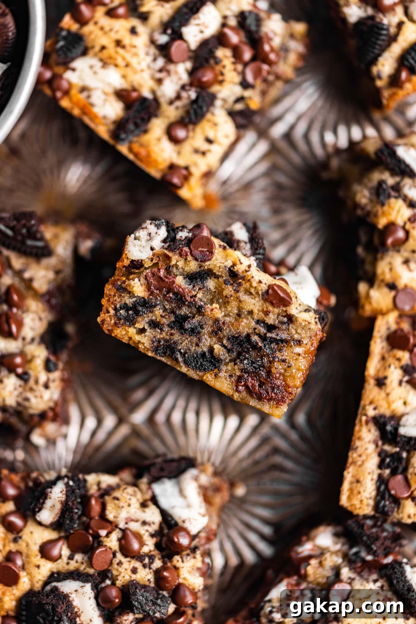 Close up of Oreo blondie on its side showing off gooey texture.