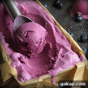 Blueberry Buttermilk Ice Cream tastes just like blueberry pie but with out the crust! | Low Carb, Gluten-free, keto, sugar-free | lowcarbmaven.com