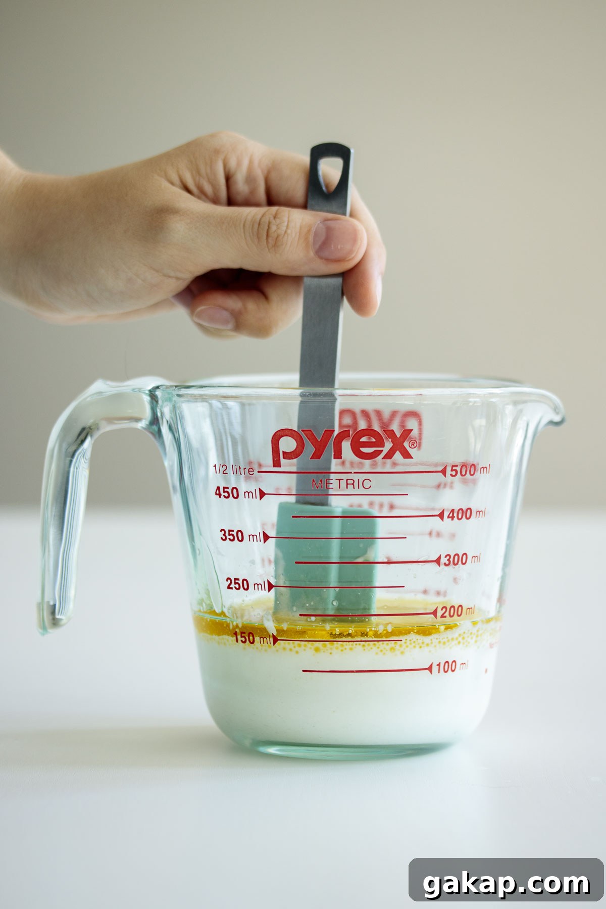 Wet ingredients being mixed.