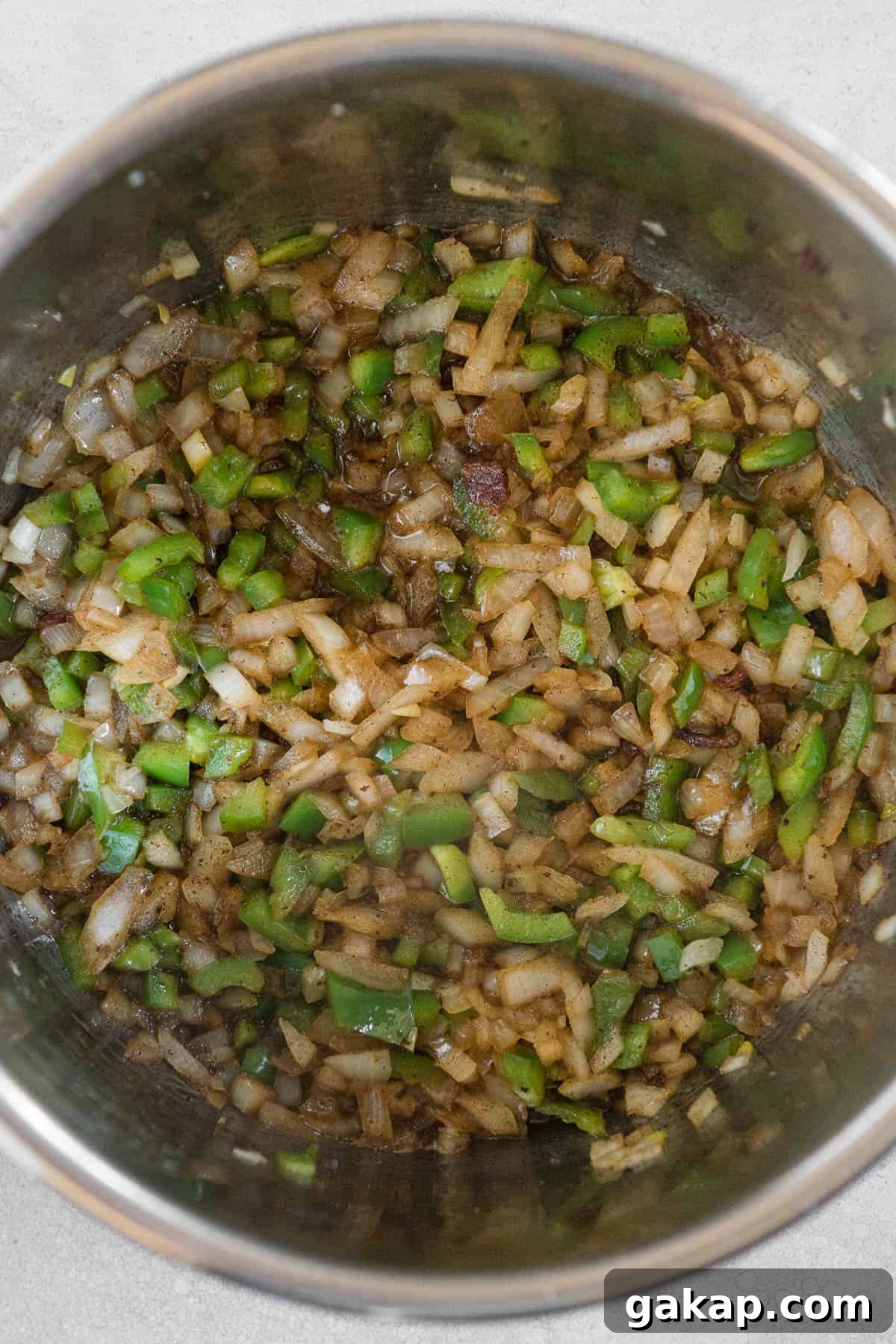 sautéed onions and peppers in bacon fat