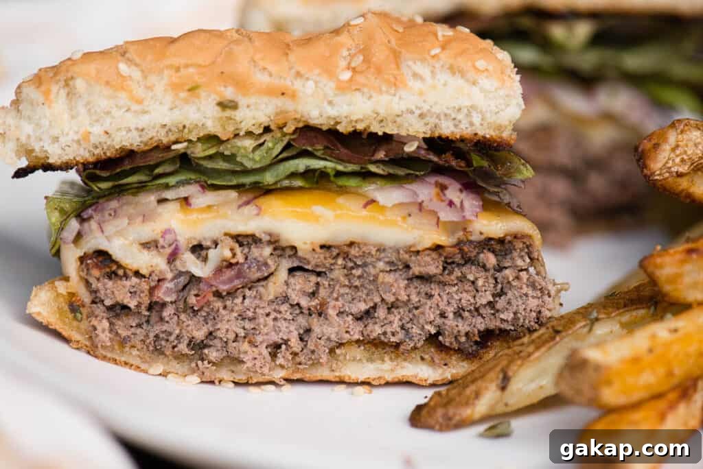 homemade cheeseburger cut in half