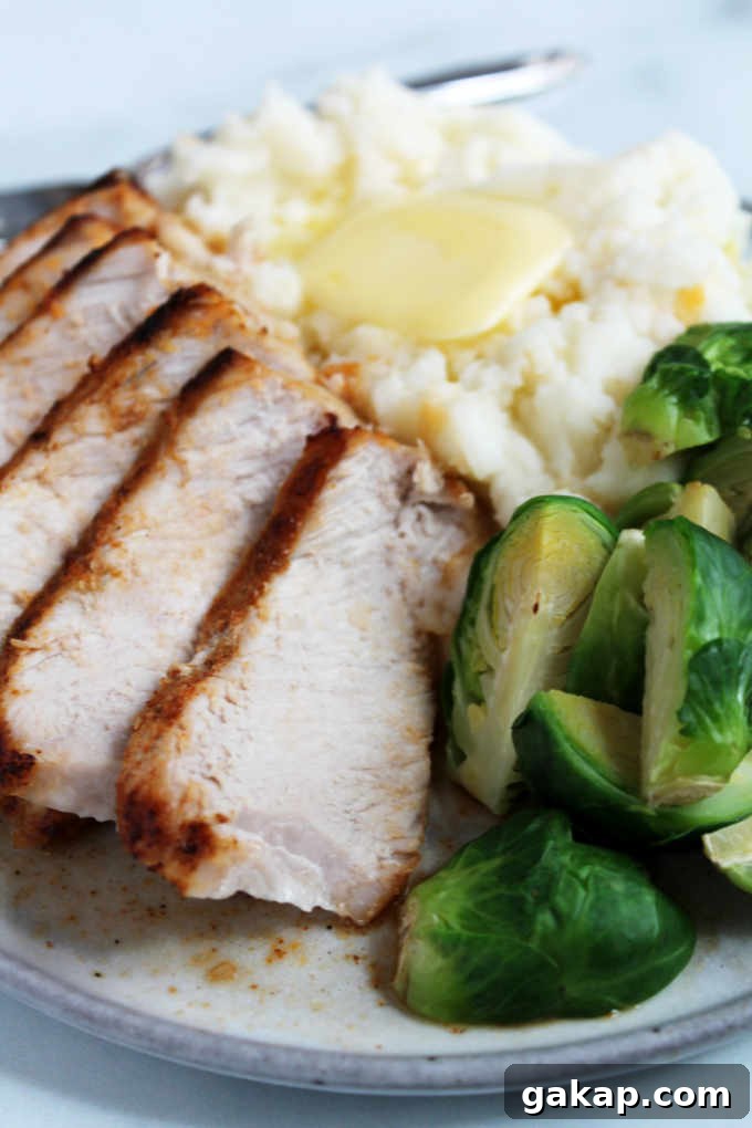 A plated serving of chipotle air fryer pork chops