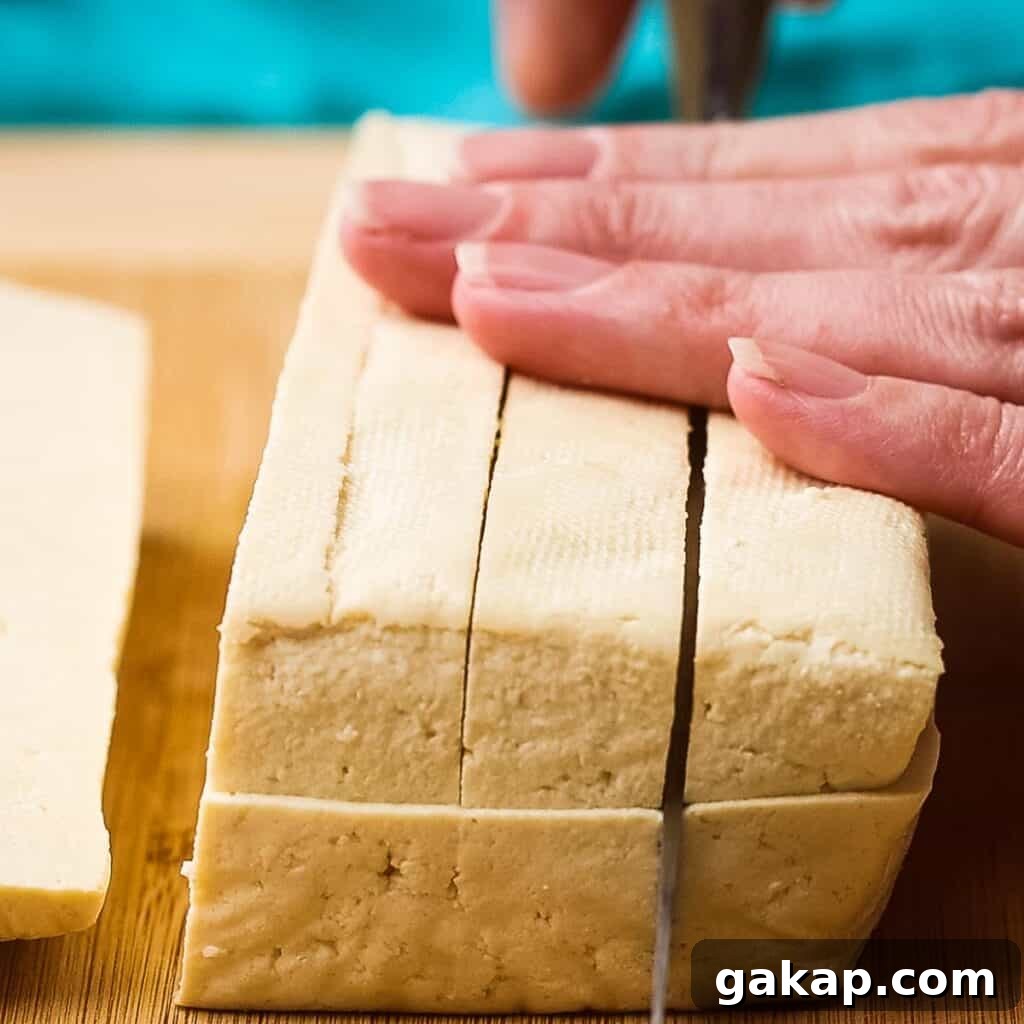Cutting the tofu.